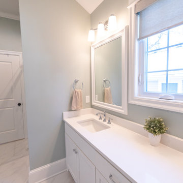 Primary Bathroom Remodel with Herringbone Flooring + Custom Shower