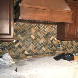 Colorful nature stone herringbone pattern backsplash - Products