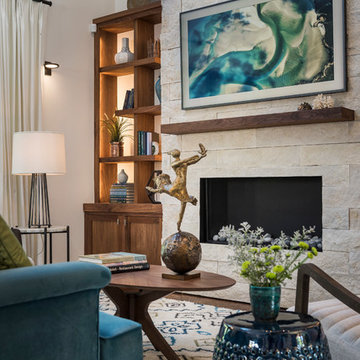Sea Toned Contemporary Living Room with Striking Stone Firepalce