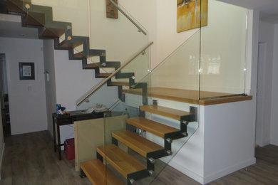 Example of a trendy staircase design in Vancouver