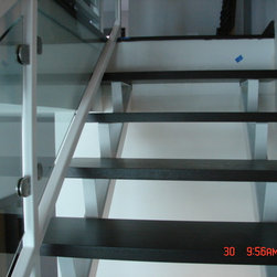 Steel stairs with glass panel - Products