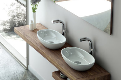 Example of a mid-sized minimalist 3/4 concrete floor and gray floor bathroom design in Other with open cabinets, medium tone wood cabinets, white walls, a vessel sink and wood countertops