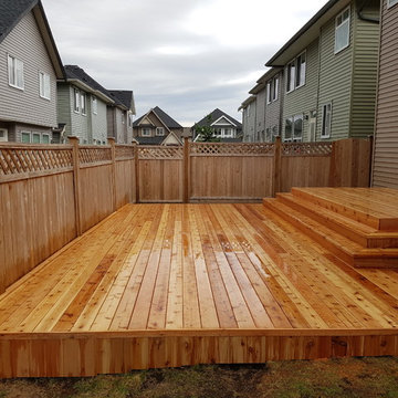 cedar deck with wrap around stairs