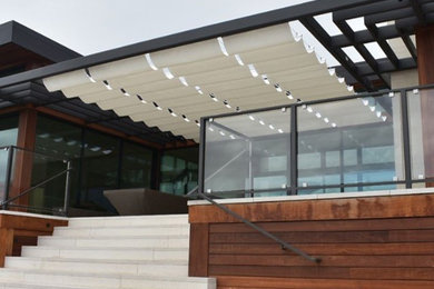 Infinity Canopy creates a transitional space at this luxury beach house