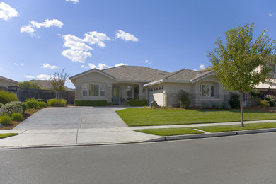 Example of a large classic two-story exterior home design in Other