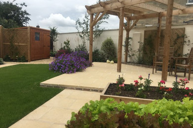 Photo of a rural garden in Wiltshire with natural stone paving.