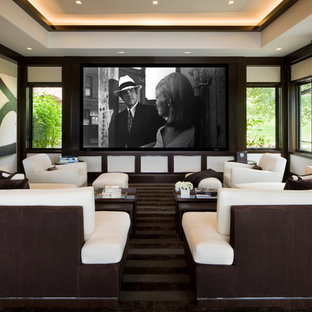 Transitional enclosed carpeted home theater photo in Denver with white walls