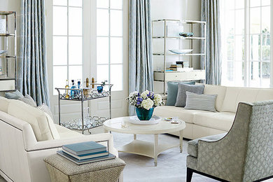 Example of a trendy open concept porcelain tile and beige floor living room design in New York with a bar, white walls, no fireplace and no tv