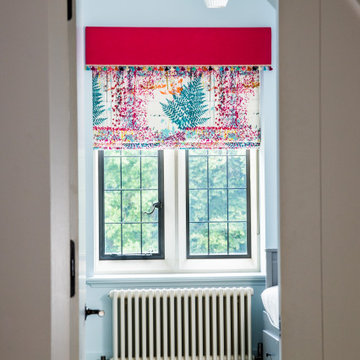 Bespoke colourful Roman blinds with contrasting pelmet