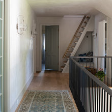 see the cubby under the stairs.. we could do something cozy like this i