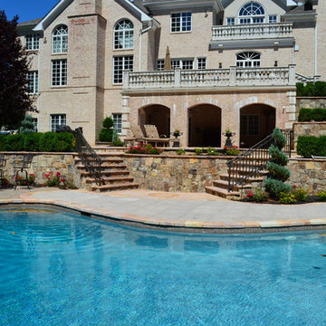Custom Pools & Spas, Outdoor Kitchens, Patios & Walkways, and Plantings