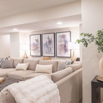 Warm & Inviting Basement Retreat with Custom Bar + Entertainment Center