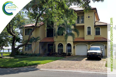 Example of a tuscan exterior home design in Tampa