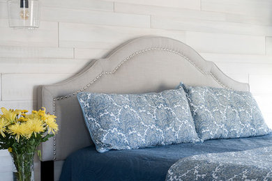 Beach style master bedroom photo in Portland Maine with no fireplace and gray walls