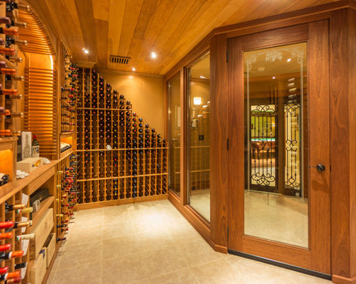 Traditional Wine Cellar Large traditional wine cellar idea in Houston with storage racks