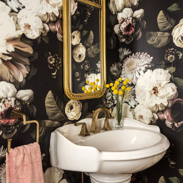 Powder room with large floral wallpaper