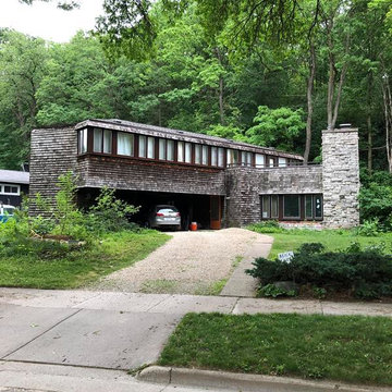 Existing wood-clad & stone masonry house