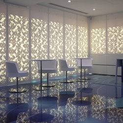 Intricate Corian&reg; wall design illuminated for a more dramatic effect - Artwork