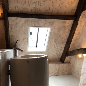 A distressed and beautiful shower in an attic