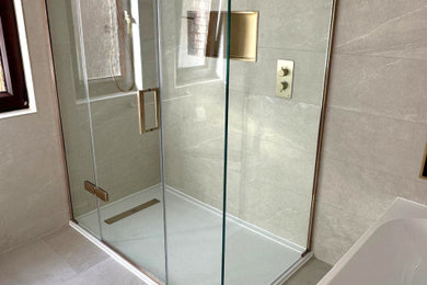 Large contemporary bathroom in Glasgow with shaker cabinets, beige cabinets, a hinged door and a built in vanity unit.