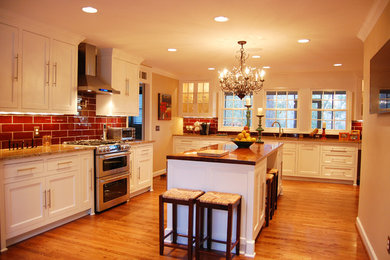 Example of a classic kitchen design in Other