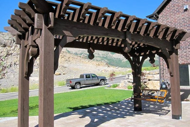 Example of a mountain style patio design in New York