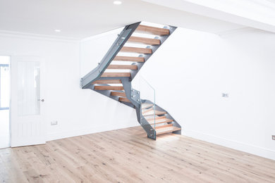 STUNNING INTERNAL GREY METAL STAIRCASE WITH LED STAIR LIGHTS