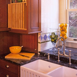 Mid-sized transitional eat-in kitchen inspiration - Eat-in kitchen - mid-sized transitional l-shaped medium tone wood floor eat-in kitchen idea in Minneapolis with a farmhouse sink, medium tone wood cabinets, beaded inset cabinets, granite countertops, white backsplash, ceramic backsplash, white appliances and an island