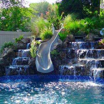 Waterfall with Slide into Pool