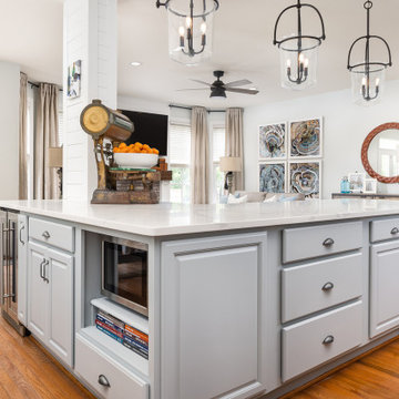 Kitchen and Sitting Room with Shiplap Hood Range and Fireplace