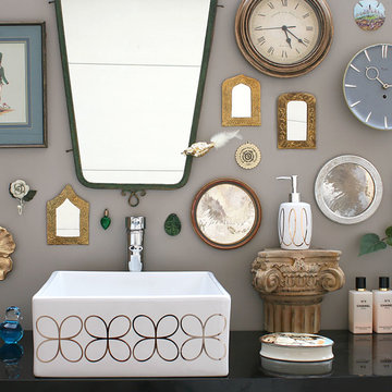 Platinum Cloverleaf Painted Vessel Sink in a Gray Powder Room