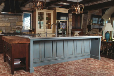Kitchen - large u-shaped brick floor and red floor kitchen idea in Chicago with beige cabinets, beige backsplash, brick backsplash, an island and gray countertops