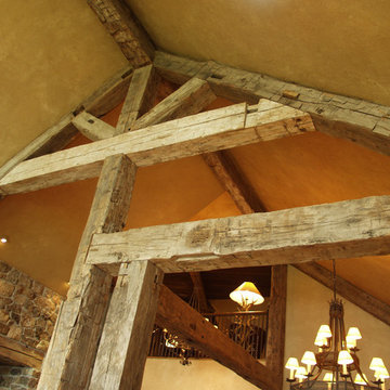 Hand Hewn Timber Truss System on a Vaulted Ceiling with King Post