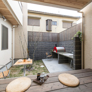 福岡の小さいアジアンスタイルのおしゃれなテラス・中庭 (張り出し屋根) の写真