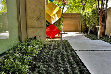 Example of a mid-century modern home design design in Vancouver