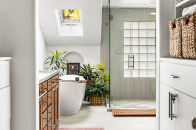 Large trendy master beige tile and terra-cotta tile double-sink bathroom photo in Seattle with raised-panel cabinets, brown cabinets, quartzite countertops, a hinged shower door, white countertops and a freestanding vanity