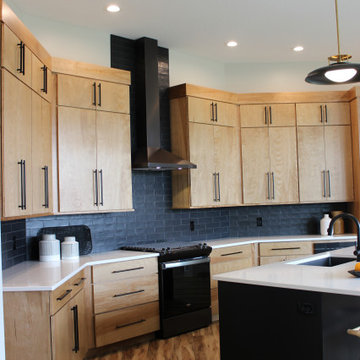 Angled Kitchen Design with Slab Style Cabinets in Pecan Stain