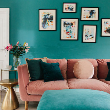 Teal and pink family living room