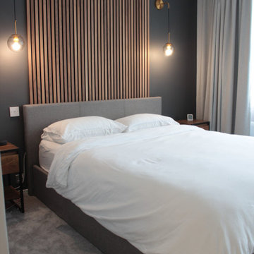 Bedroom Serenity: Black Wall, Pendant Lights, Wooden Paneling - Interior Design 