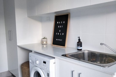 This is an example of a modern laundry room in Brisbane.
