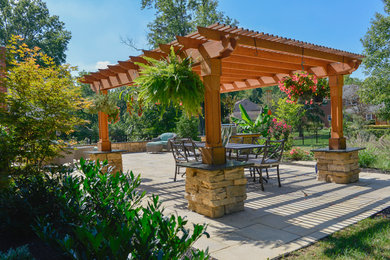 Patio - traditional backyard patio idea in Cincinnati with a pergola
