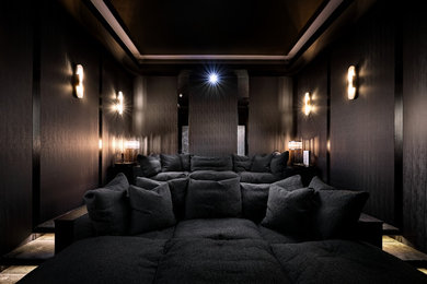 Design ideas for a medium sized contemporary home cinema in Essex with grey walls, carpet, a projector screen, grey floors and feature lighting.