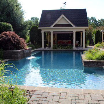 Lower Saucon custom pool with raised planters & sheer descent waterfall
