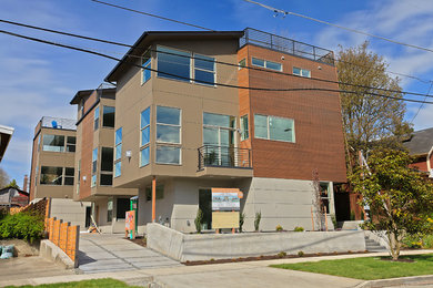 Minimalist three-story mixed siding house exterior photo in Seattle