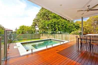 This is an example of a modern backyard deck in Brisbane.