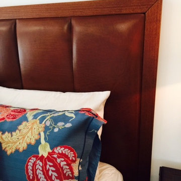 Close up of custom designed bed-head with leather panels