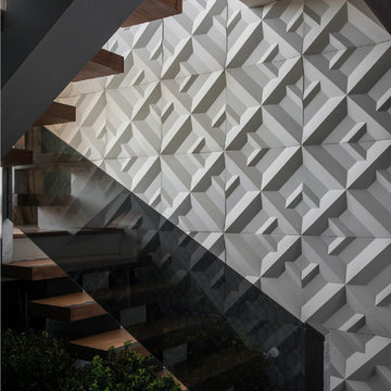 Modern staircase with white concrete panels