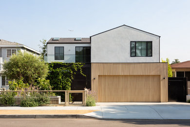 Example of a mid-sized trendy two-story wood house exterior design in Los Angeles