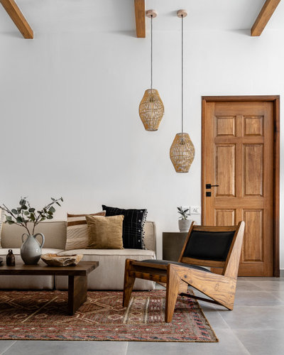 Eclectic Living Room by Sunita Yogesh Studio