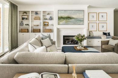 Example of a large transitional open concept dark wood floor living room design in Charlotte with white walls, a standard fireplace, a stone fireplace and a wall-mounted tv